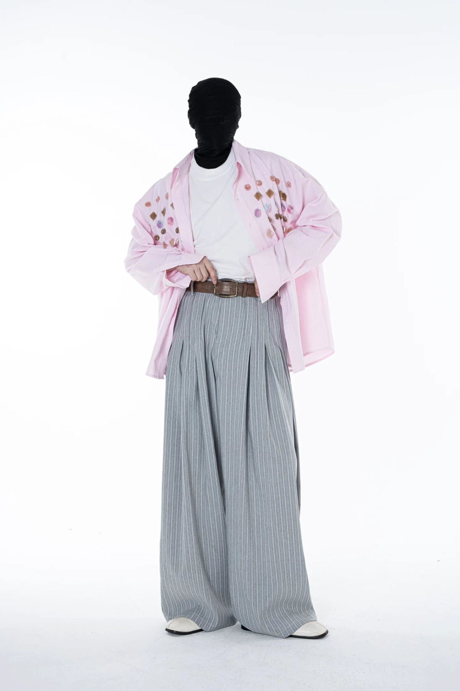 Front streetwear styling view of Cloudline light grey pinstripe pleated trousers with dramatic wide leg volume