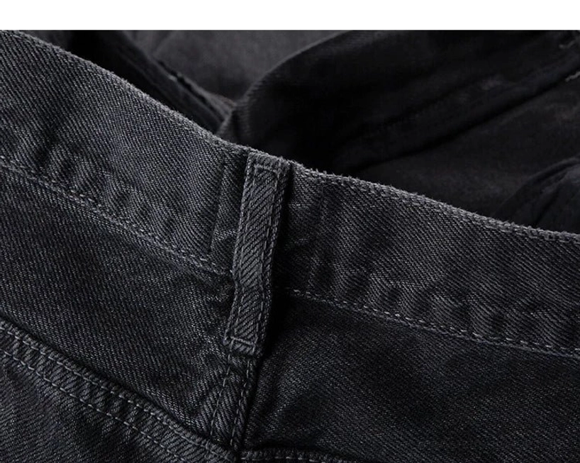 Modern washed black wide-leg denim pants with roomy proportions for Seoul-inspired streetwear and everyday urban outfits