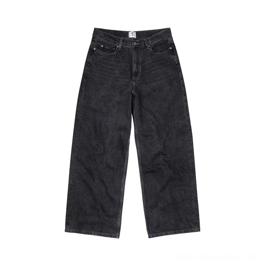 Washed black wide-leg denim jeans shown from the front in a flat lay with a high-rise waist and classic five-pocket streetwear design