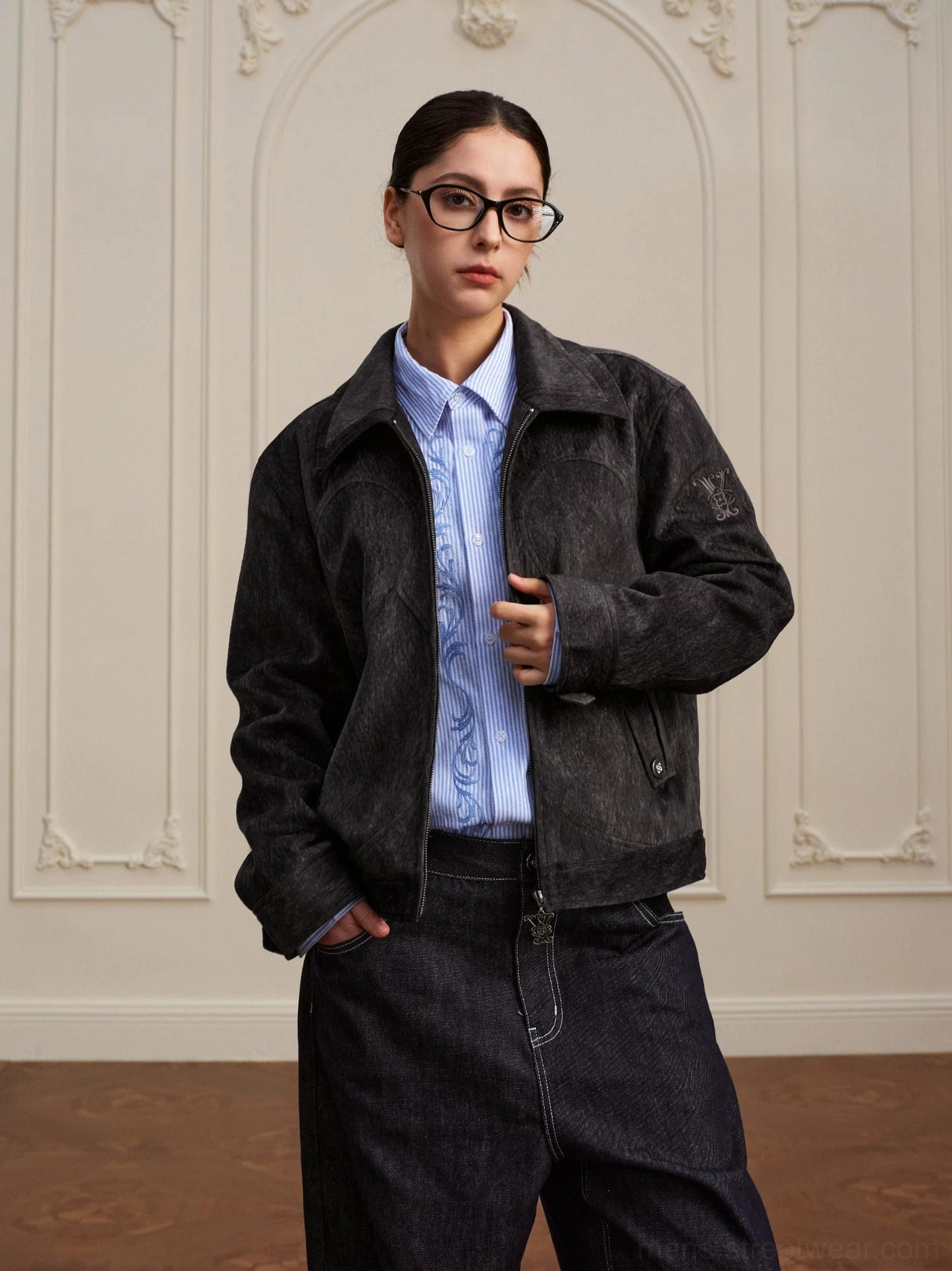 Coffee black textured Western yoke cropped zip jacket front view styled with light blue shirt and wide leg denim