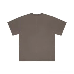 Deep coffee brown oversized cotton jersey T-shirt with central front seam, contrast stitching, crew neck, and boxy loose East Asian streetwear silhouette