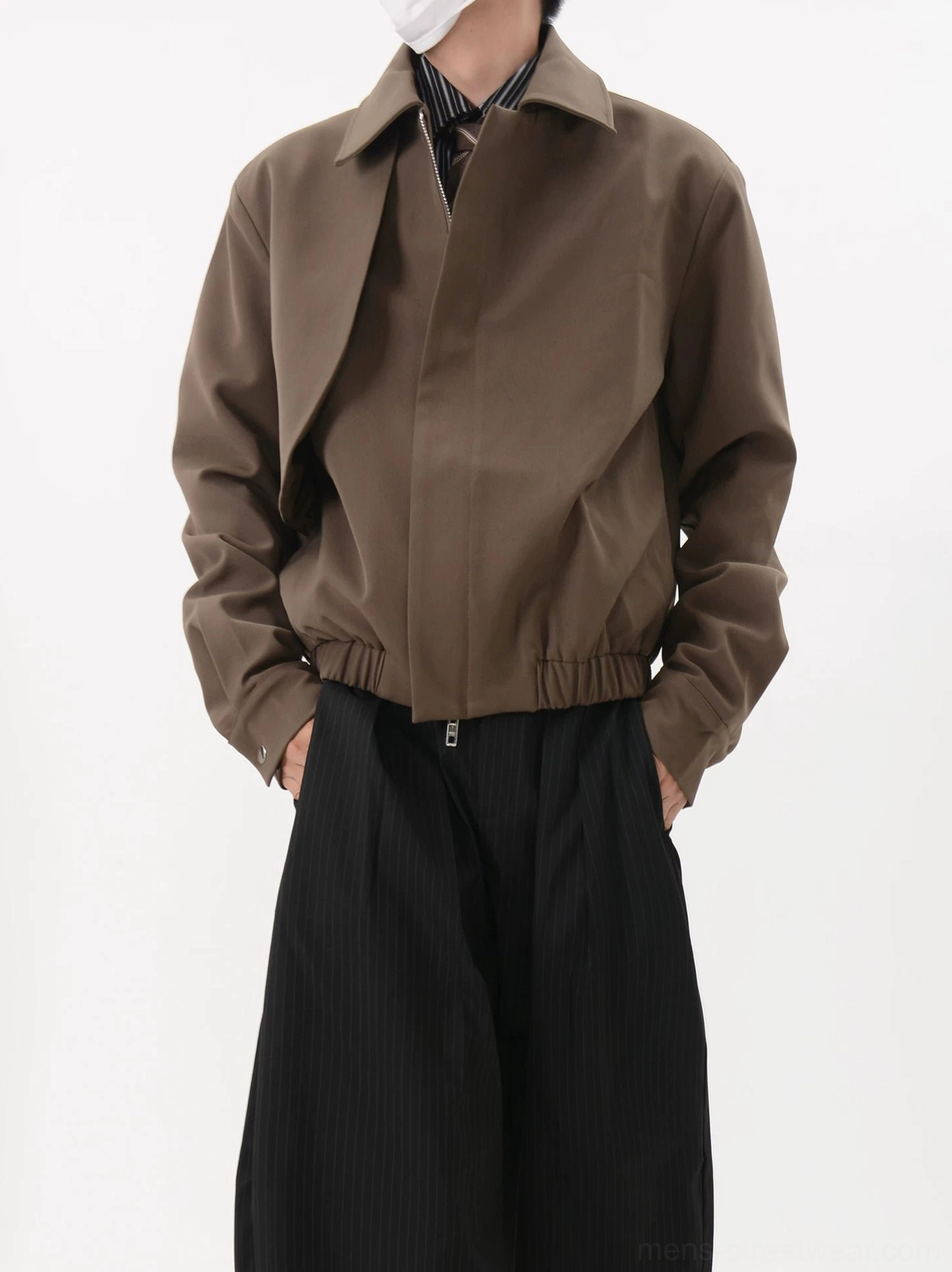 Coffee brown cropped blouson jacket with point collar and concealed zip front styled with wide-leg trousers