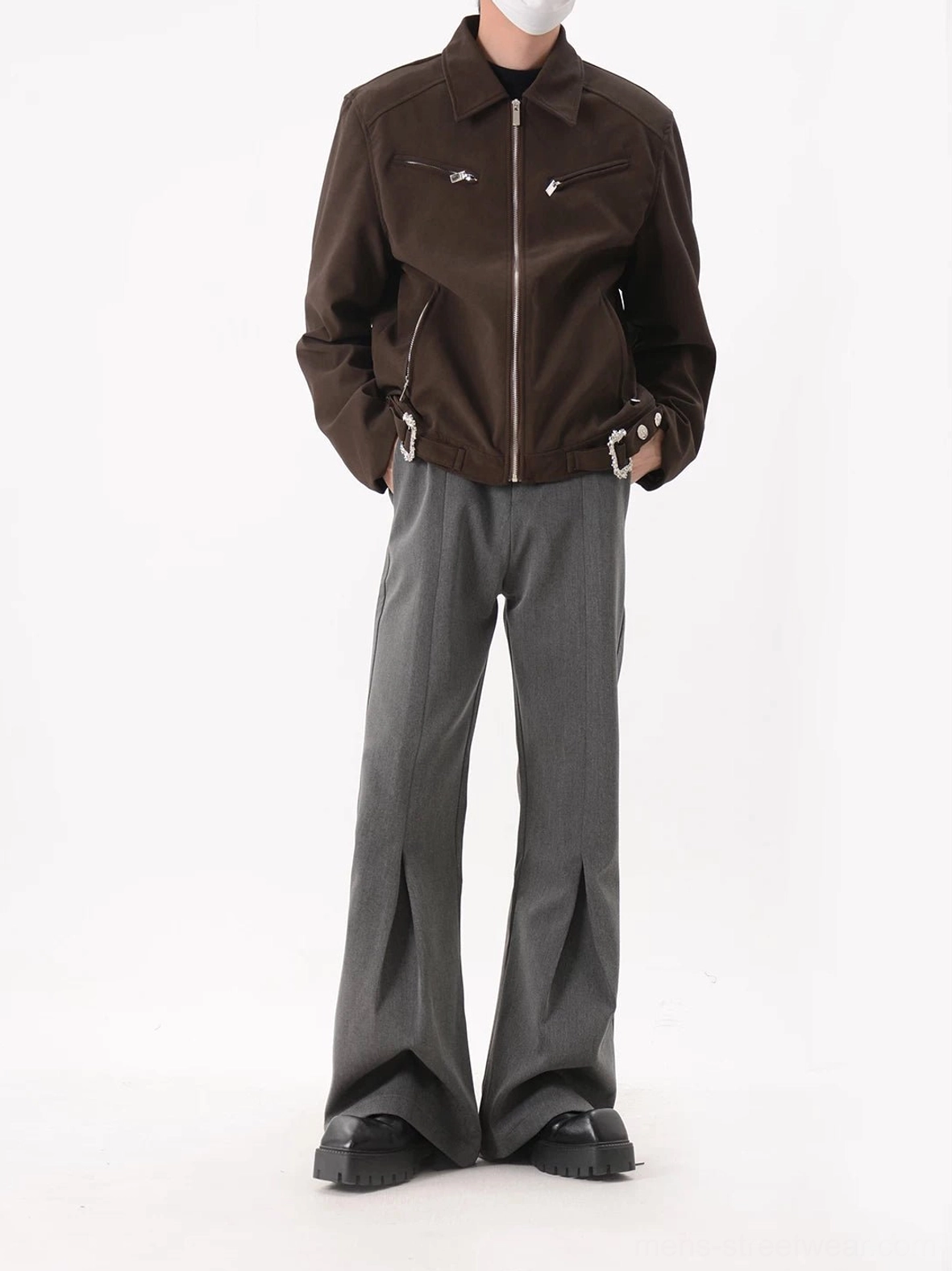 Coffee brown moto-inspired streetwear jacket shown from the front with full zip closure exposed pockets and decorative cuff hardware