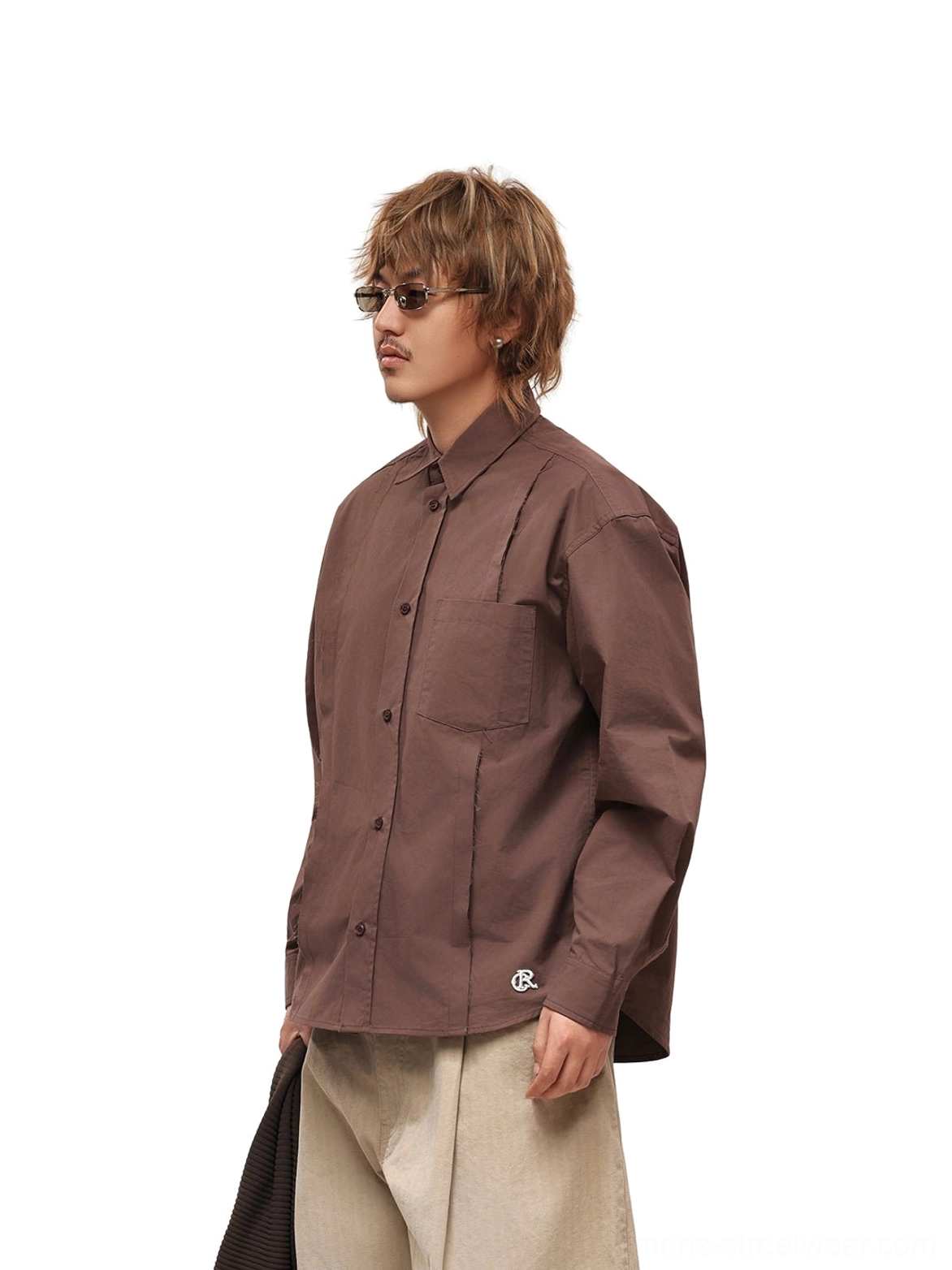 Male model wearing coffee brown relaxed poplin overshirt with beige wide-leg trousers in Korean streetwear outfit