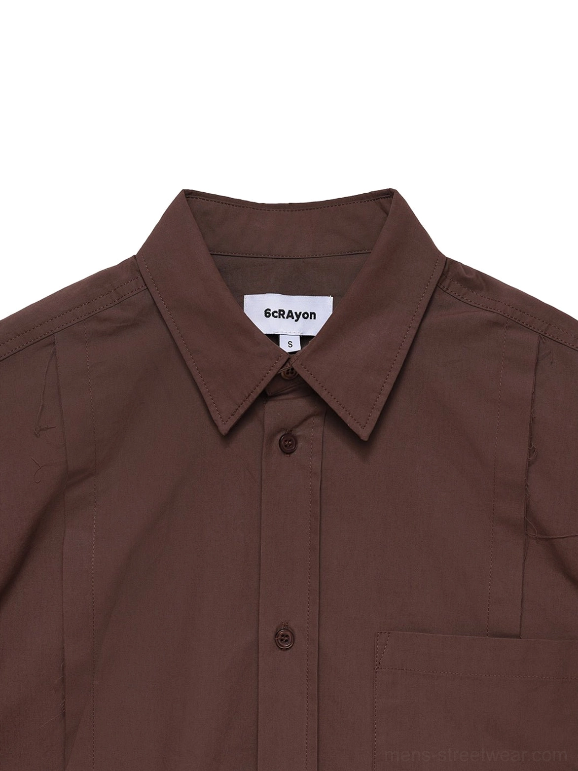 Close-up of coffee brown poplin overshirt pointed collar button placket and front pleated detail