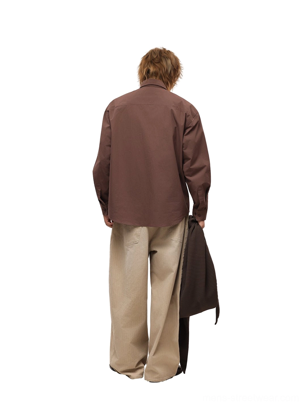 Back view of relaxed coffee brown long-sleeve poplin overshirt styled with beige wide-leg pants