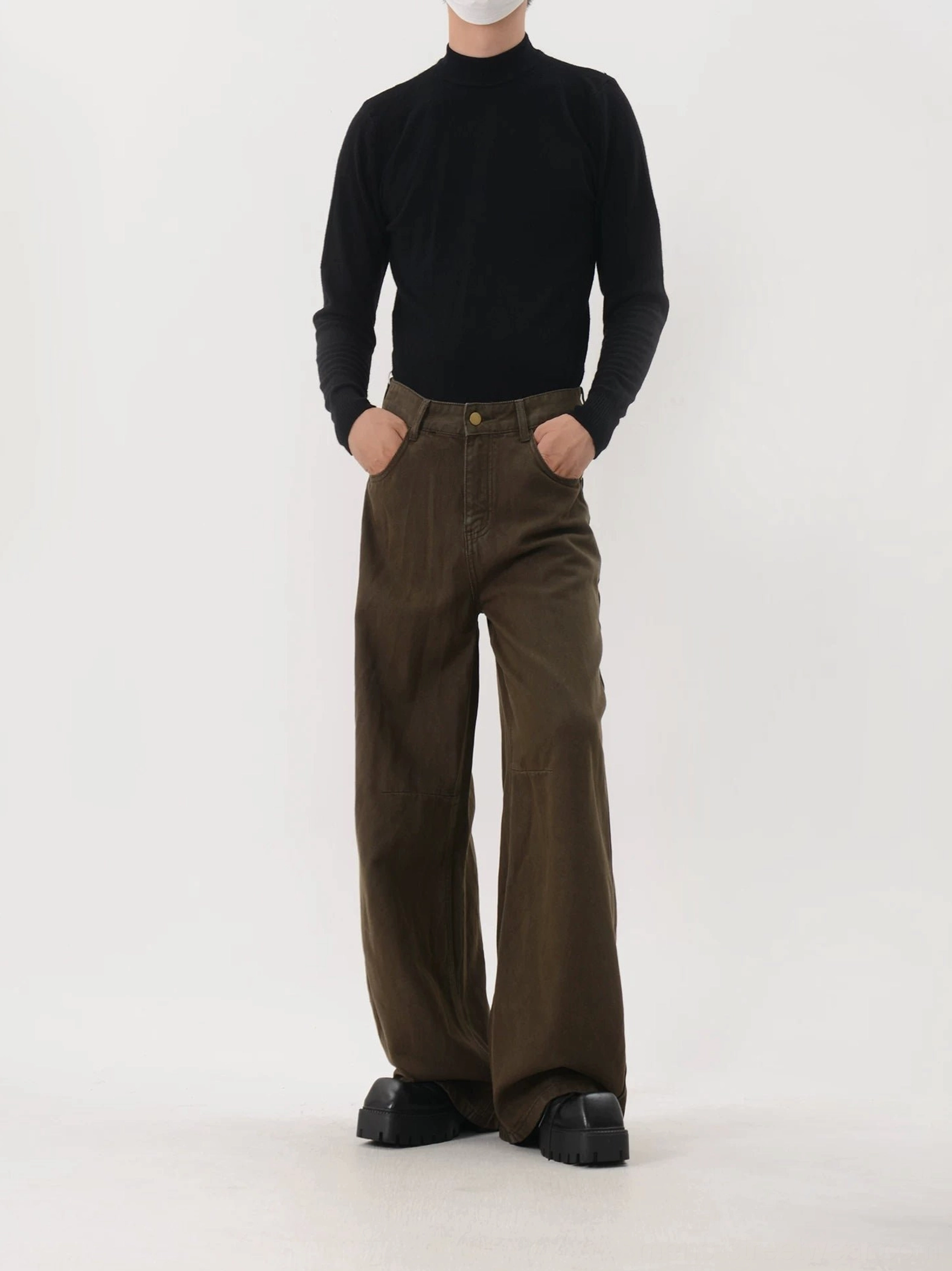 Close-up front view of coffee brown washed American retro wide-leg pants with relaxed fit, front pockets, structured waistband, and contemporary Seoul streetwear styling