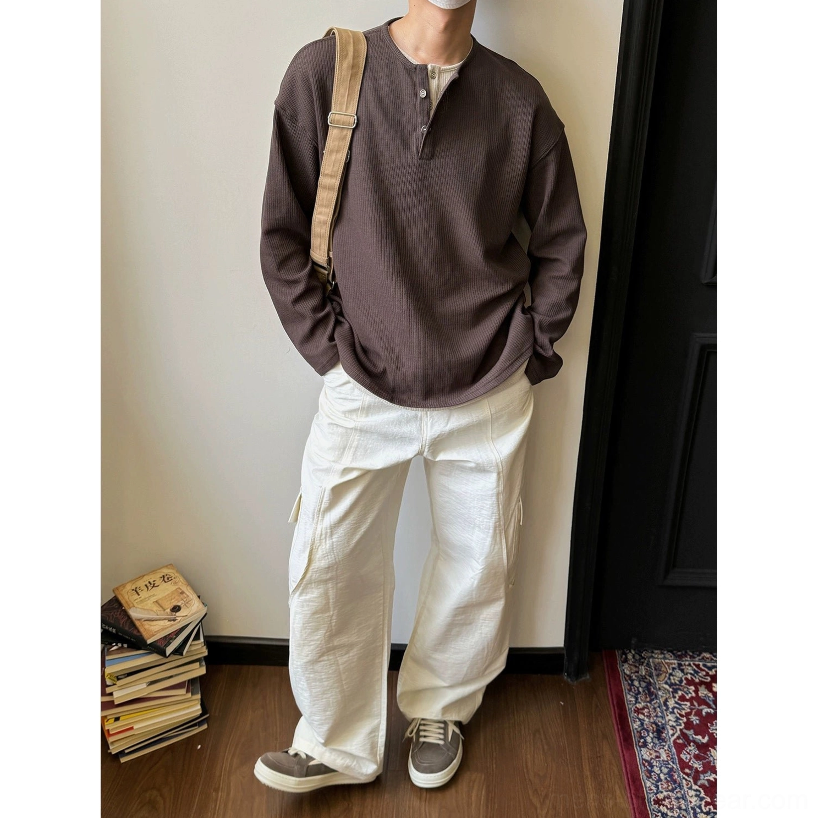 Coffee color waffle knit Henley shirt with relaxed unisex fit and textured long-sleeve streetwear design