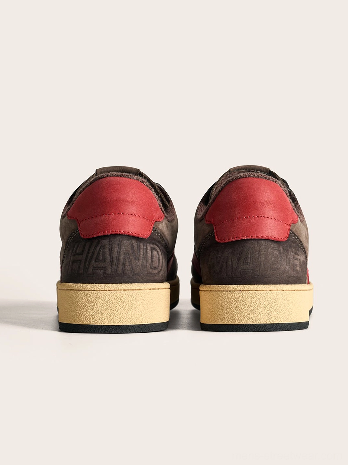 Retro streetwear sneaker design in coffee and gray featuring a bold side star, layered upper, and casual low-top court profile