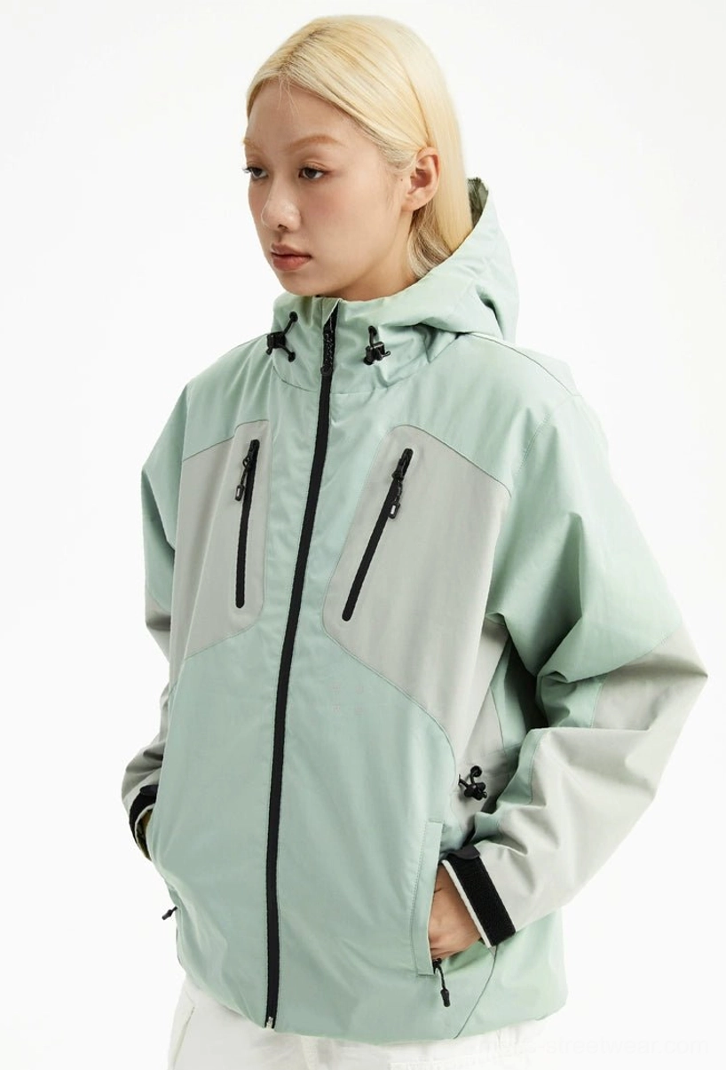 Mint green color-block hooded outdoor padded jacket shown from the front at a three-quarter angle with zippered chest pockets and adjustable hem