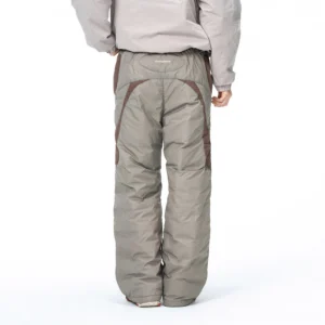 Back view of khaki padded track pants showing the rear contrast panel and relaxed Korean streetwear fit