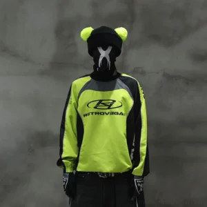 Neon lime green and black color block racing raglan jersey shown from the front in urban streetwear styling