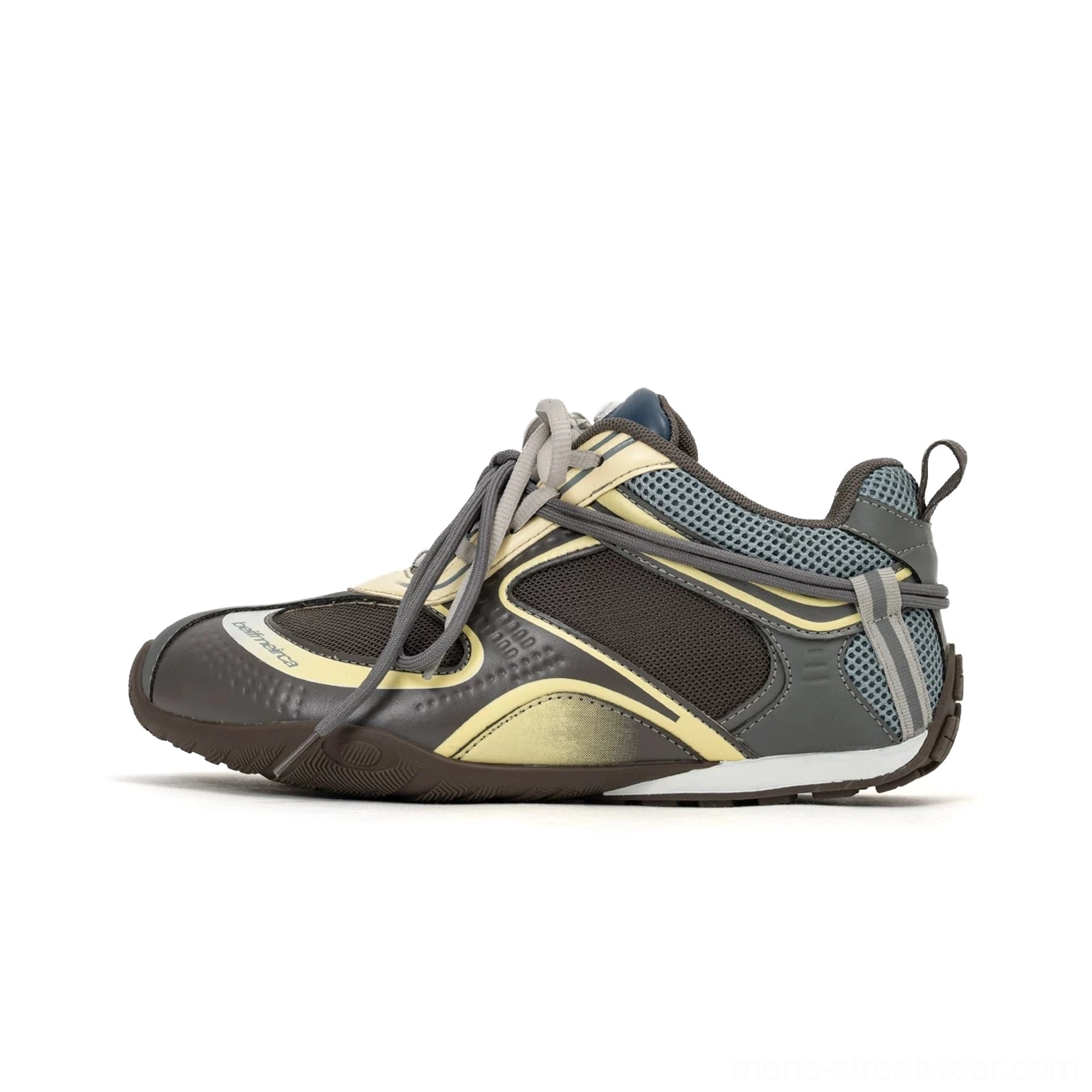 Color-blocked retro runner sneakers in dark gray yellow and light blue with racing lines mesh panels and streetwear sole