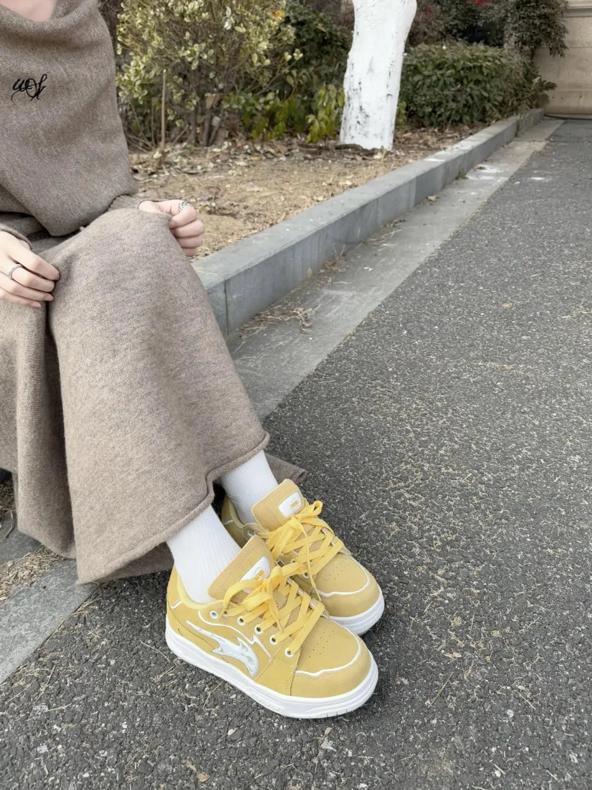 Color-pop low-top skate sneakers in a bold saturated streetwear colorway with paneled upper, contrast side detail, and white rubber outsole