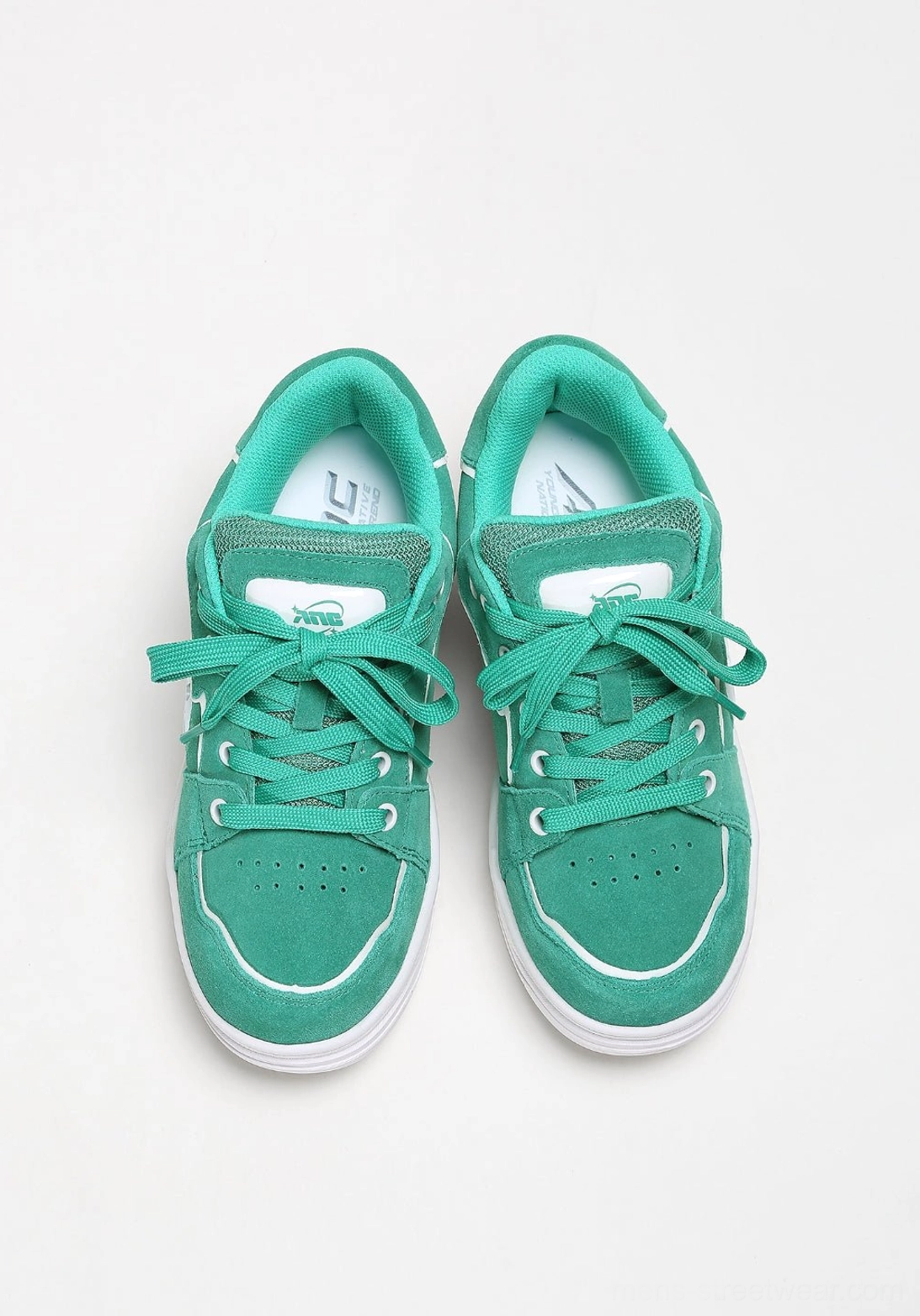 Saturated color streetwear sneakers with a clean court-inspired shape, contrast side design, and chunky white sole