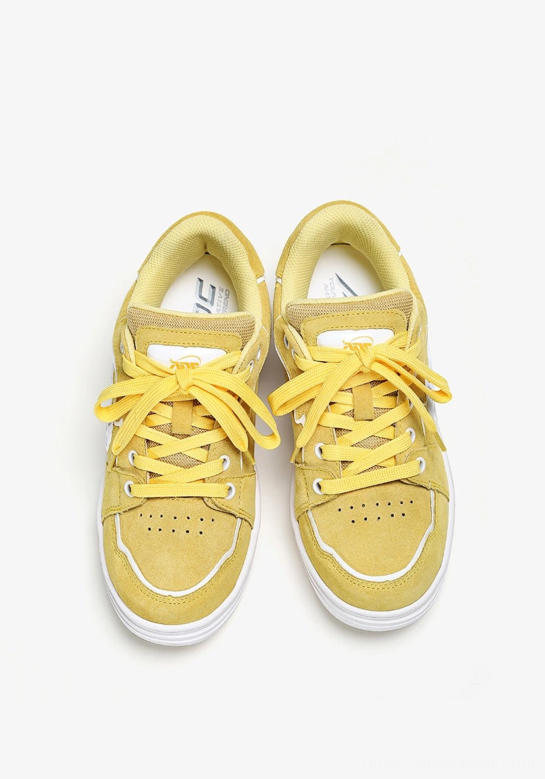 Modern East Asian streetwear skate sneakers with vibrant upper color, contrast side detailing, padded collar, and flat outsole