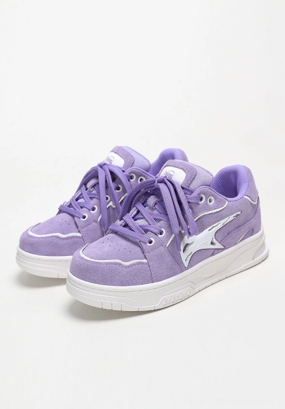 Unisex colorful skate footwear with paneled mixed-material construction, bold laces, and a durable-looking rubber outsole