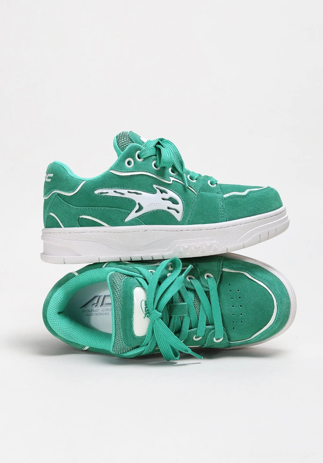 Bold casual skate sneakers featuring a flat rubber outsole, padded collar, paneled upper, and expressive streetwear color