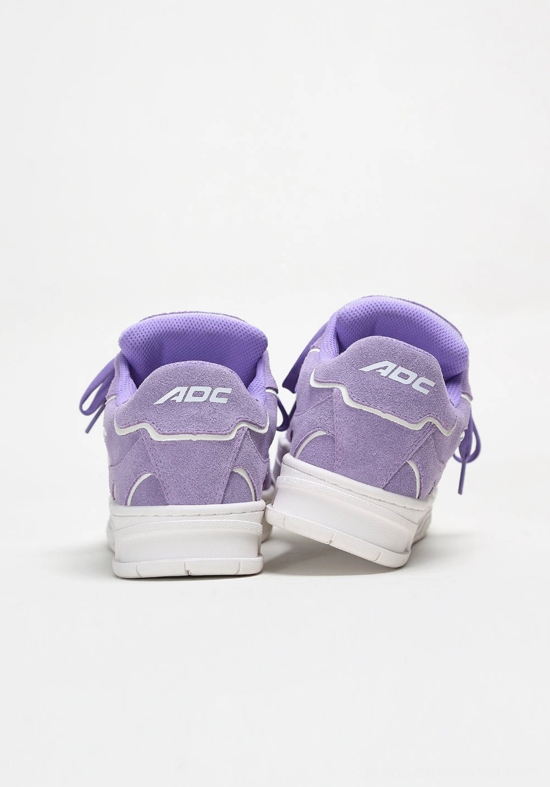 Vibrant unisex streetwear skate sneakers with a classic low-top profile, textured upper panels, and contrasting white sole