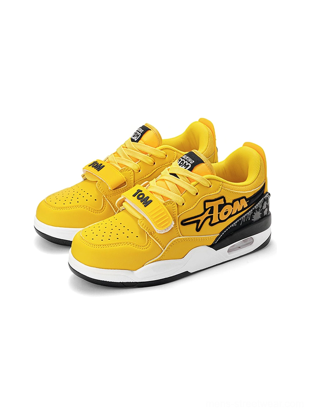 Colorblock basketball-inspired court sneakers with chunky proportions, playful graphic panels, adjustable strap, and cushioned streetwear sole