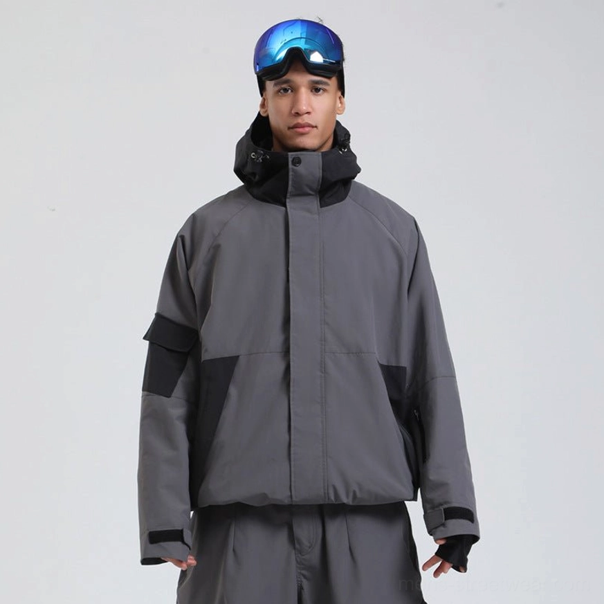 Dark grey and black colorblock snowboard shell jacket with hood, adjustable cuffs and coordinated snow pants