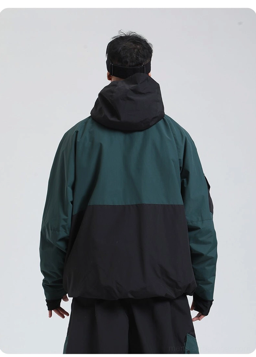 Colorblock snowboard shell jacket utility pocket and zipper detail for winter sports and gorpcore styling