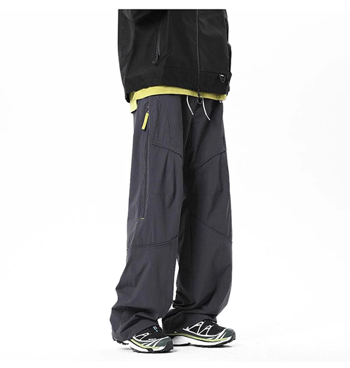 Contemporary East Asian streetwear cargo pants with technical panel construction and relaxed outdoor aesthetic