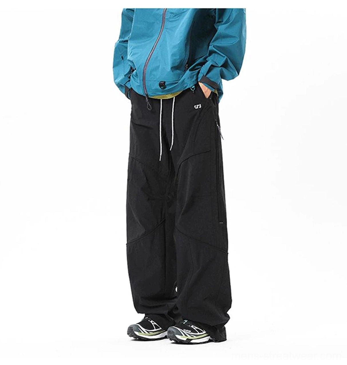 Modern technical cargo pants with relaxed fit, adjustable waist, and outdoor-inspired streetwear design