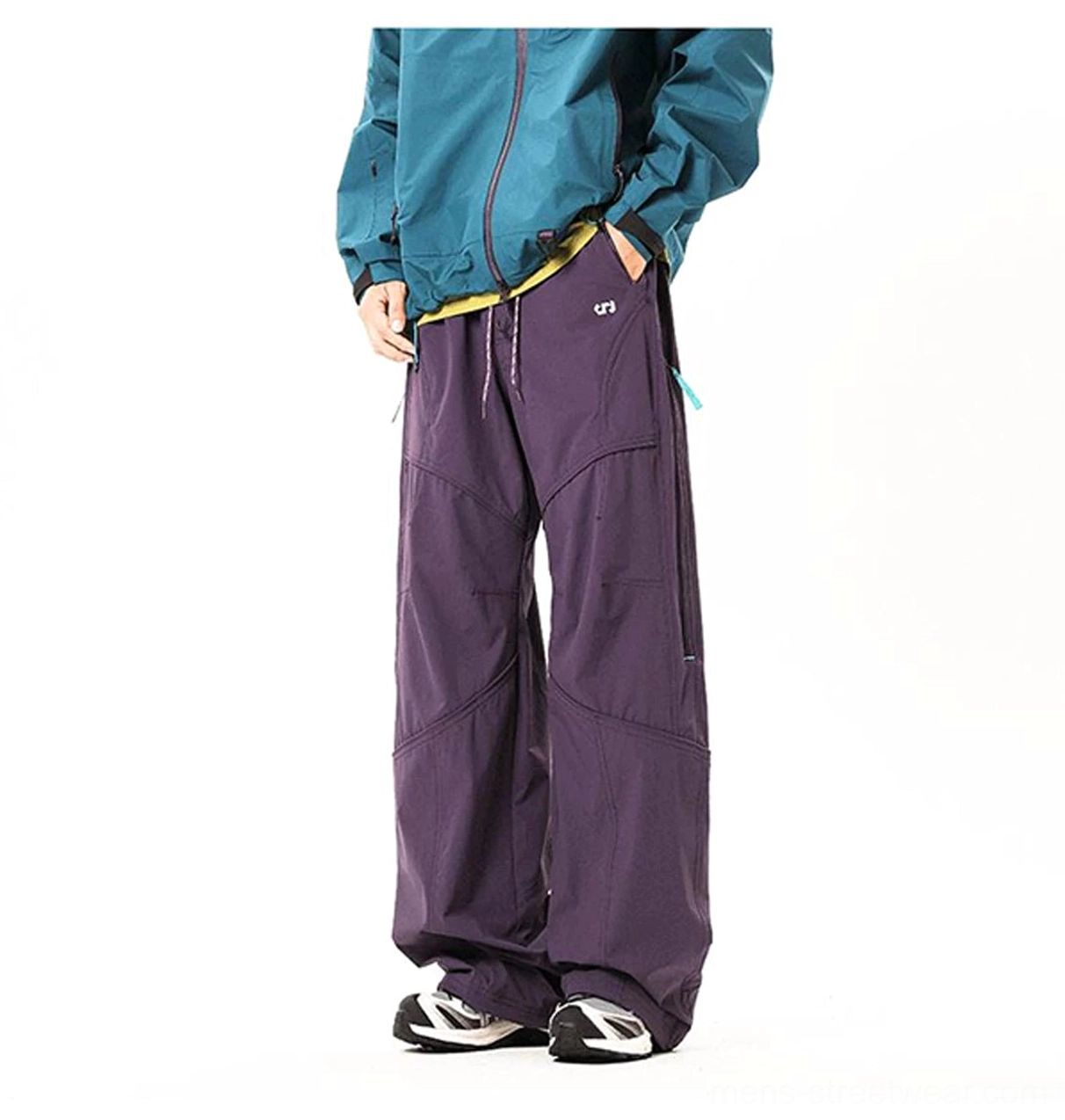 Dark purple men's tech cargo pants in a relaxed streetwear fit with adjustable drawcord waist and side pockets