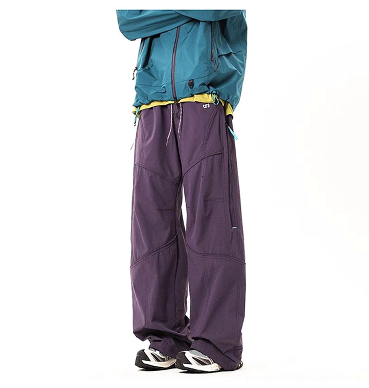 Dark purple full-length tech cargo pants shown from the rear with a relaxed wide-leg outdoor streetwear silhouette