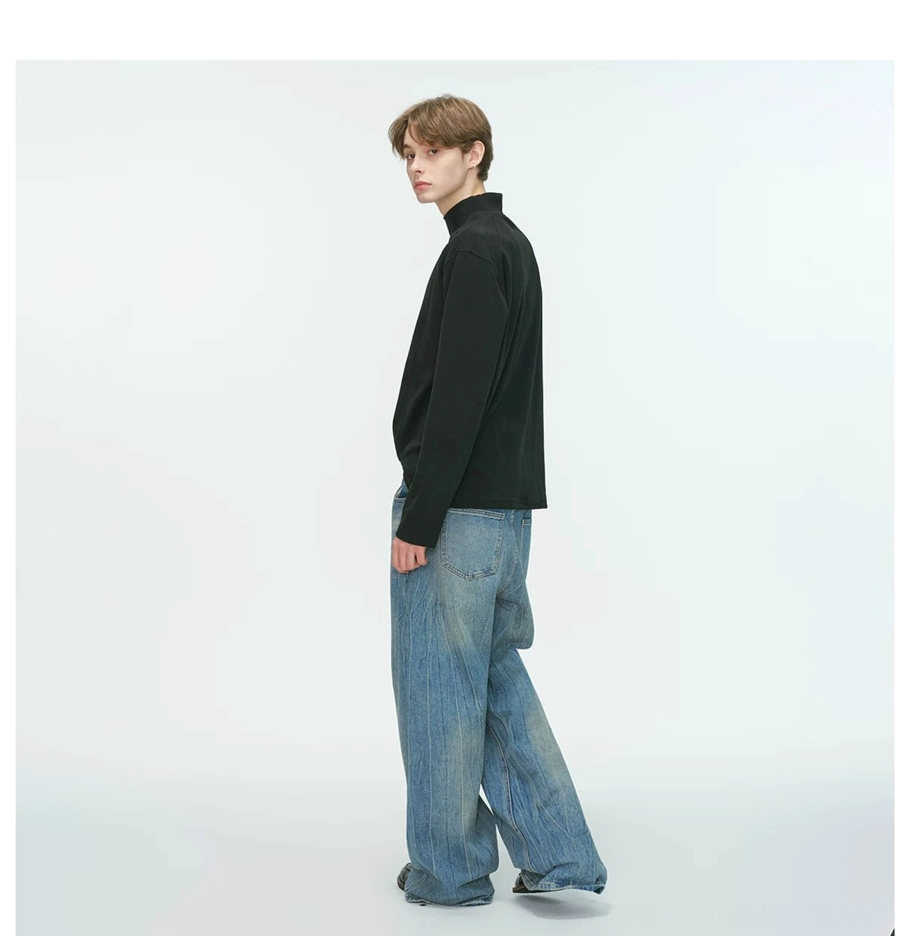 Contemporary men's mock neck long sleeve top with a clean front panel and versatile layered streetwear design