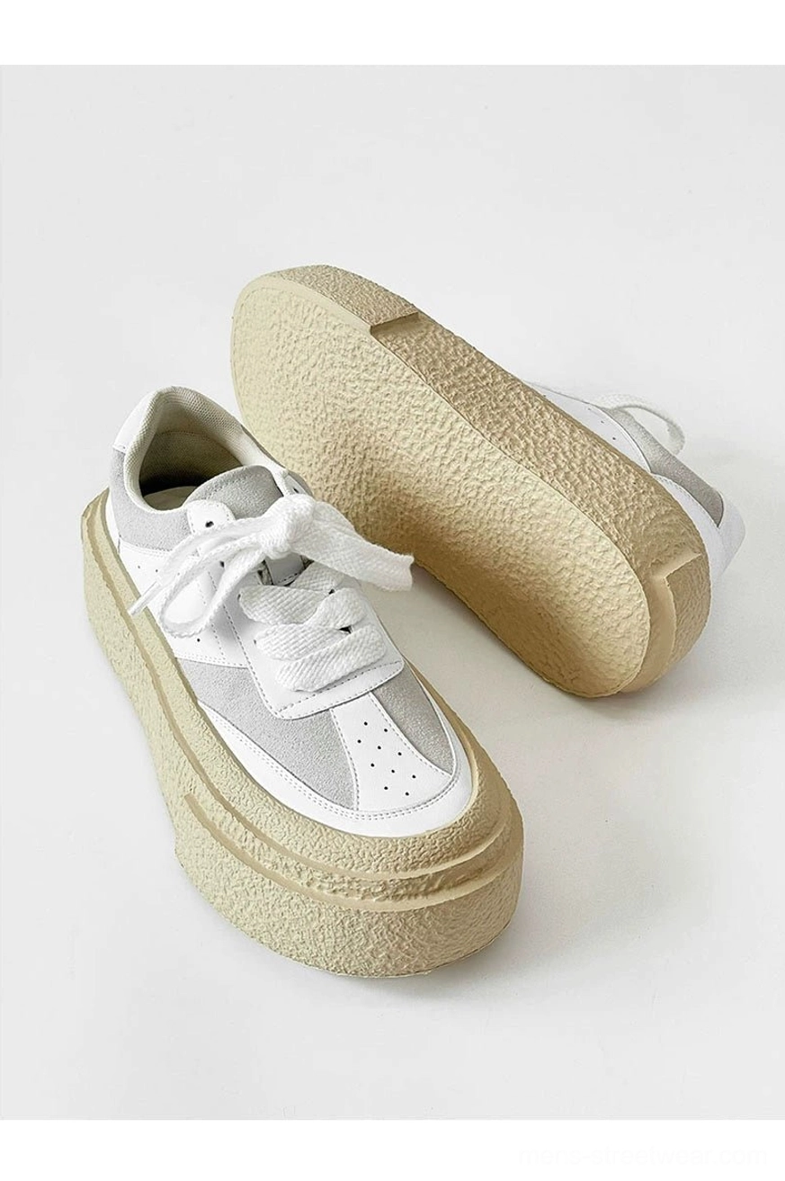 Contemporary platform sneakers with an exaggerated rubber sole for Acubi and avant-garde outfits