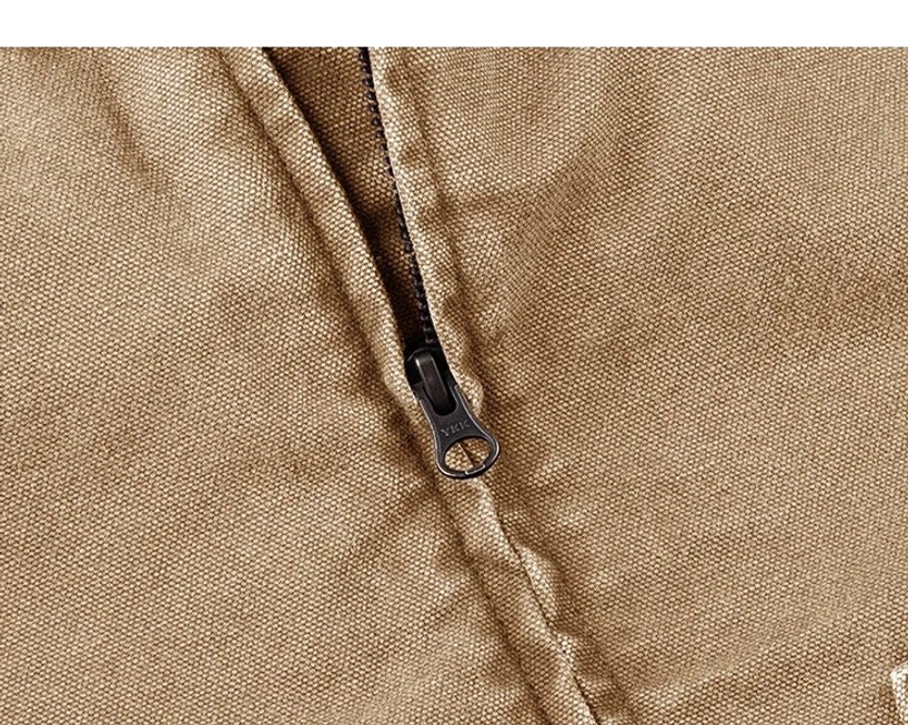 Contemporary utility outerwear jacket with cotton canvas shell, quilted polyester lining, and adjustable button cuffs