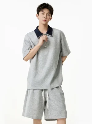 Heather gray contrast collar quarter-zip streetwear shorts set with navy collar and adjustable drawstring shorts