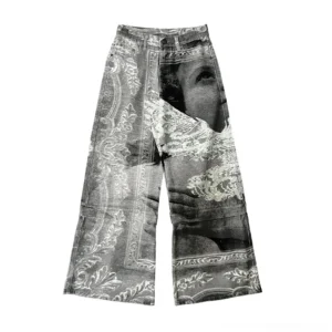Front flat lay of washed gray convertible wide-leg jeans with monochrome portrait, flying bird, and retro damask-inspired digital art print