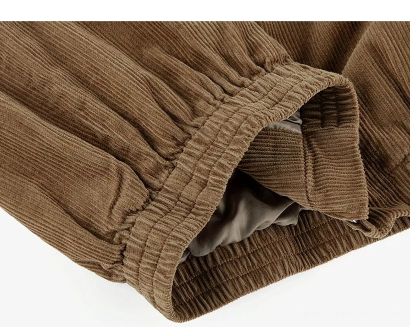 Close-up gathered elasticated sleeve hem on corduroy Harrington jacket with soft lining and clean folded edge
