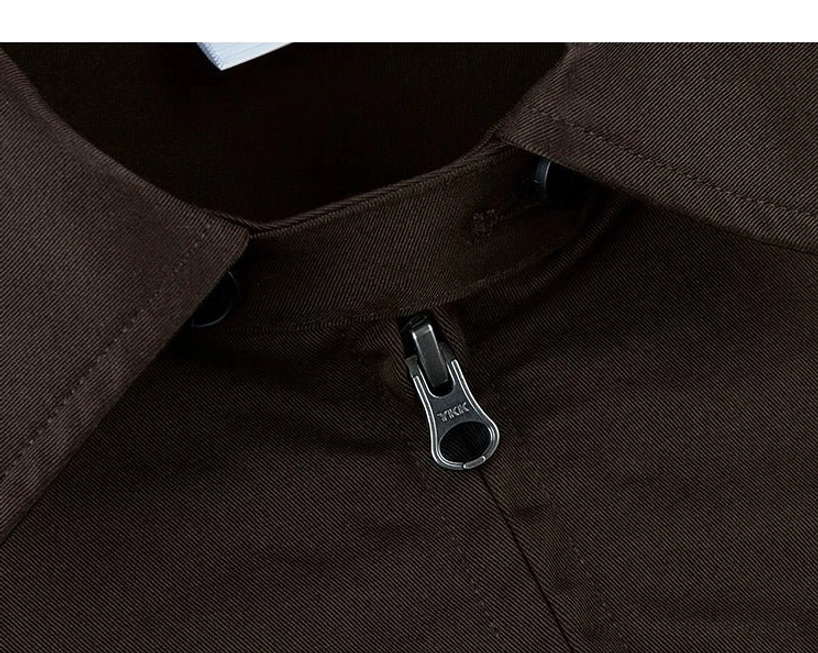 Close-up of the cotton twill Harrington jacket collar and metal front zipper with collar fastening button and refined streetwear fabric texture