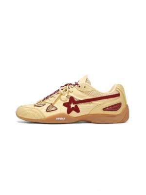 Cream and contrast star retro running sneaker side view with layered panels, breathable mesh, lace-up front, and gum rubber outsole