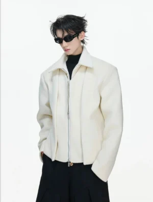 Cream white double-zip cropped wool jacket with wide collar sculpted front panels and black turtleneck styling