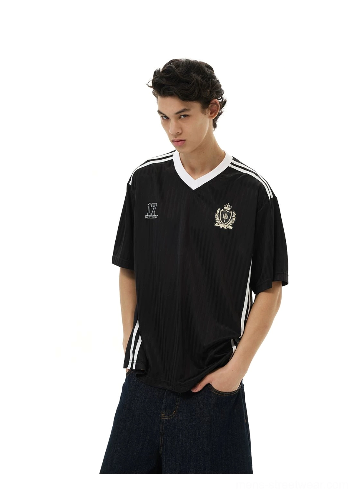 Crested soccer jersey tee product image featuring relaxed pinstripe construction, sporty graphics, and contemporary streetwear styling