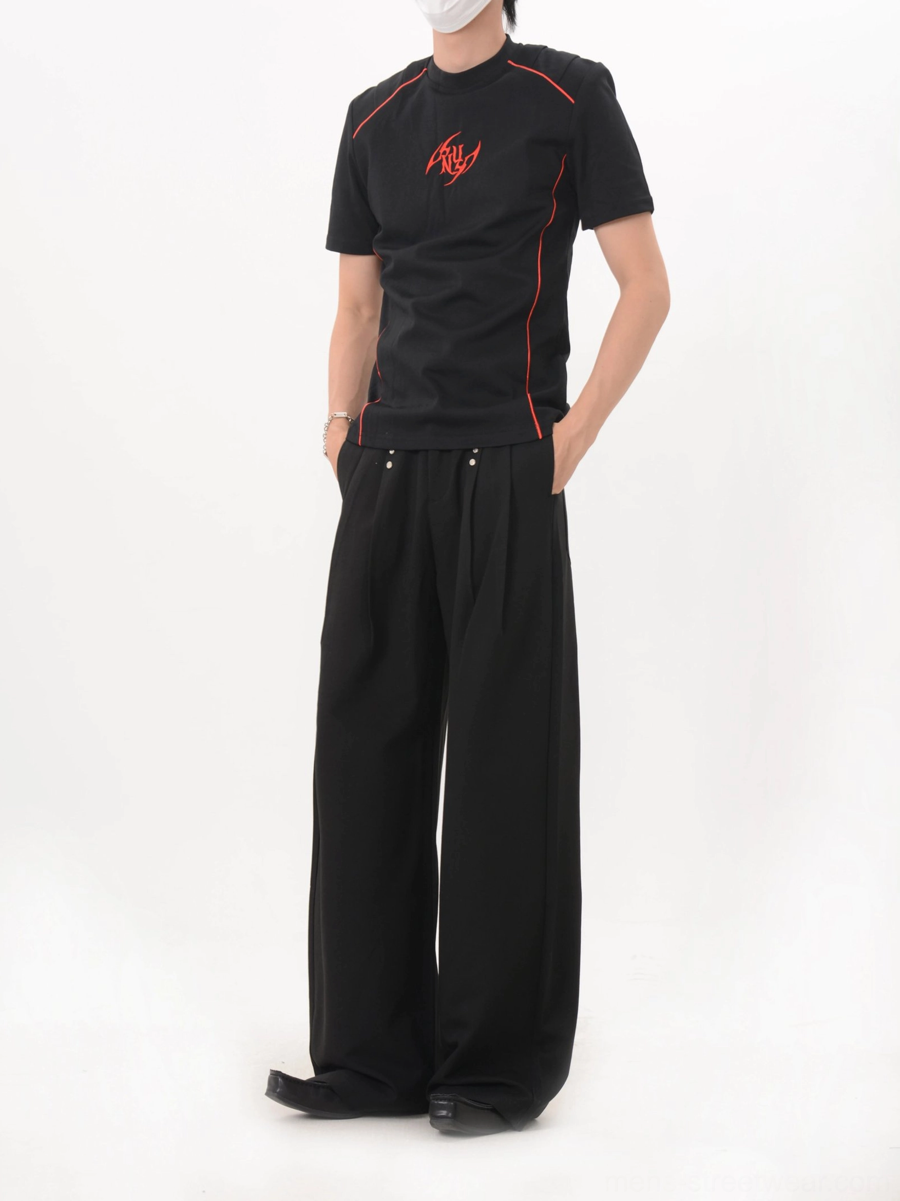 Black fitted racing T-shirt shown in a full side view with streamlined red contrast piping and modern Korean streetwear styling