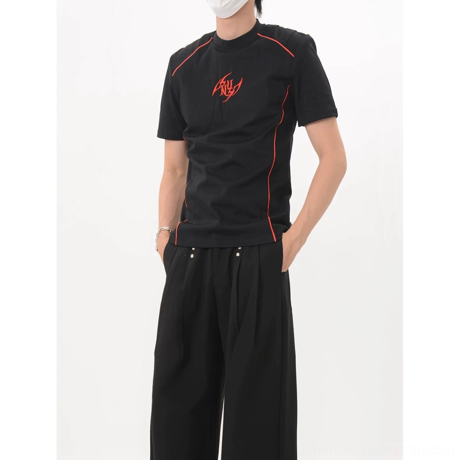 Crimson Circuit black racing-style streetwear T-shirt with red chest emblem and structured athletic silhouette