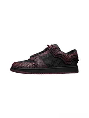 Crimson and black Jin Yi Wei inspired embossed low-top streetwear sneakers shown in left side profile with wine red relief panels and dark rubber sole
