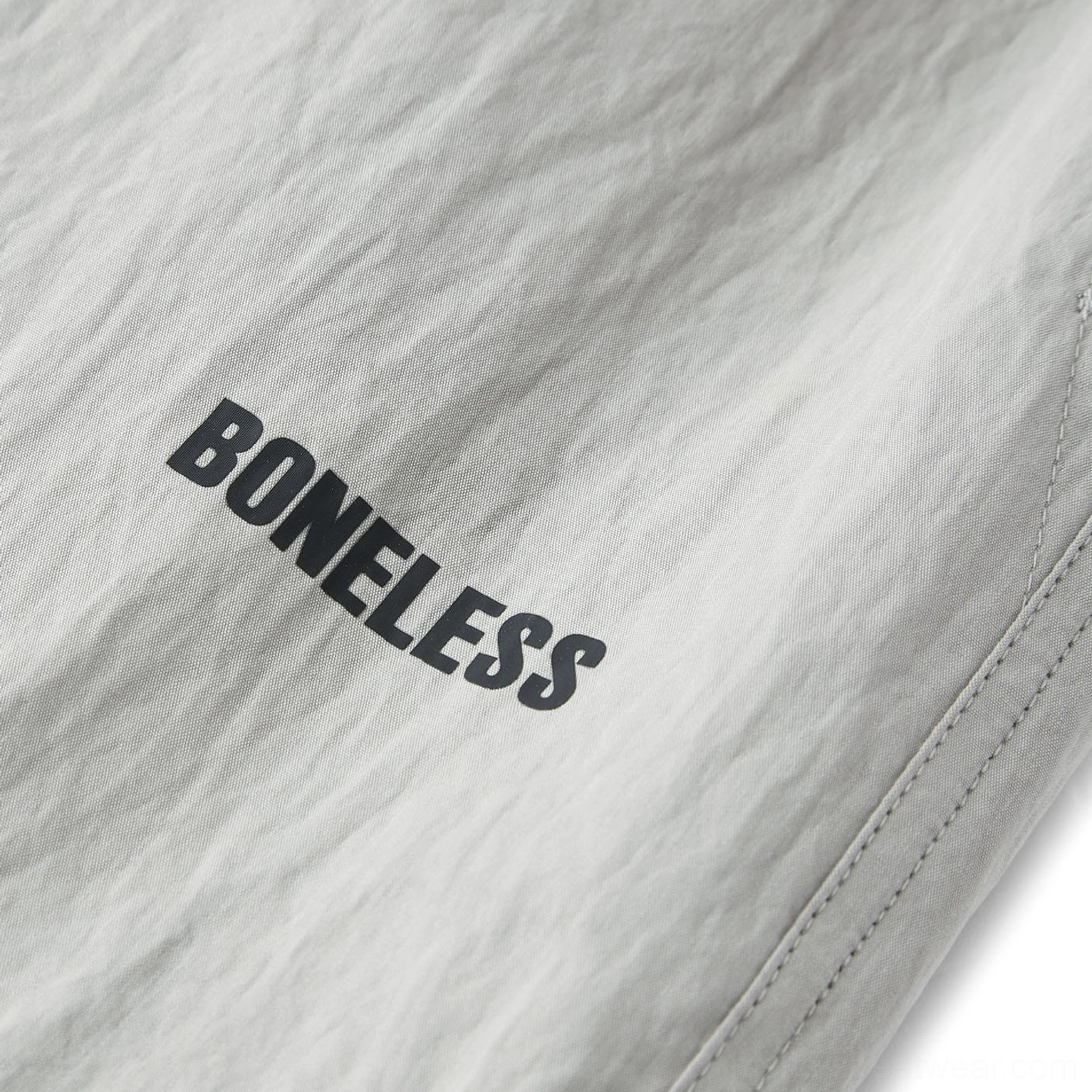 Crinkled wide-leg drawstring track pants styled as a versatile Korean streetwear wardrobe essential