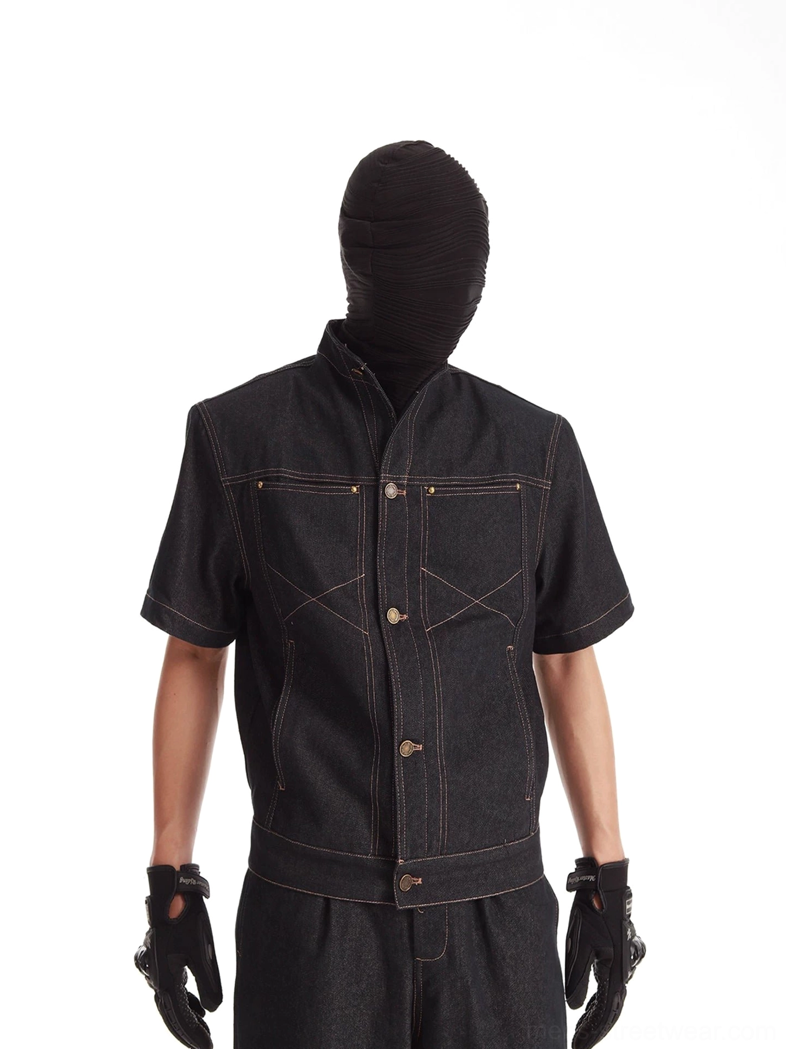 Cropped black stand-collar short-sleeve denim jacket with contrast stitching dual chest pockets and structured utility panel details