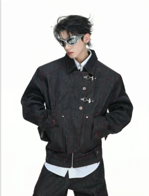 Cropped boxy black denim jacket styled with a white shirt and futuristic sunglasses