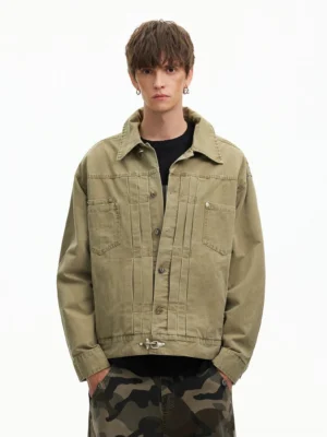 Khaki cropped fieldwork utility jacket front view with pleated chest pockets and metal hem buckle