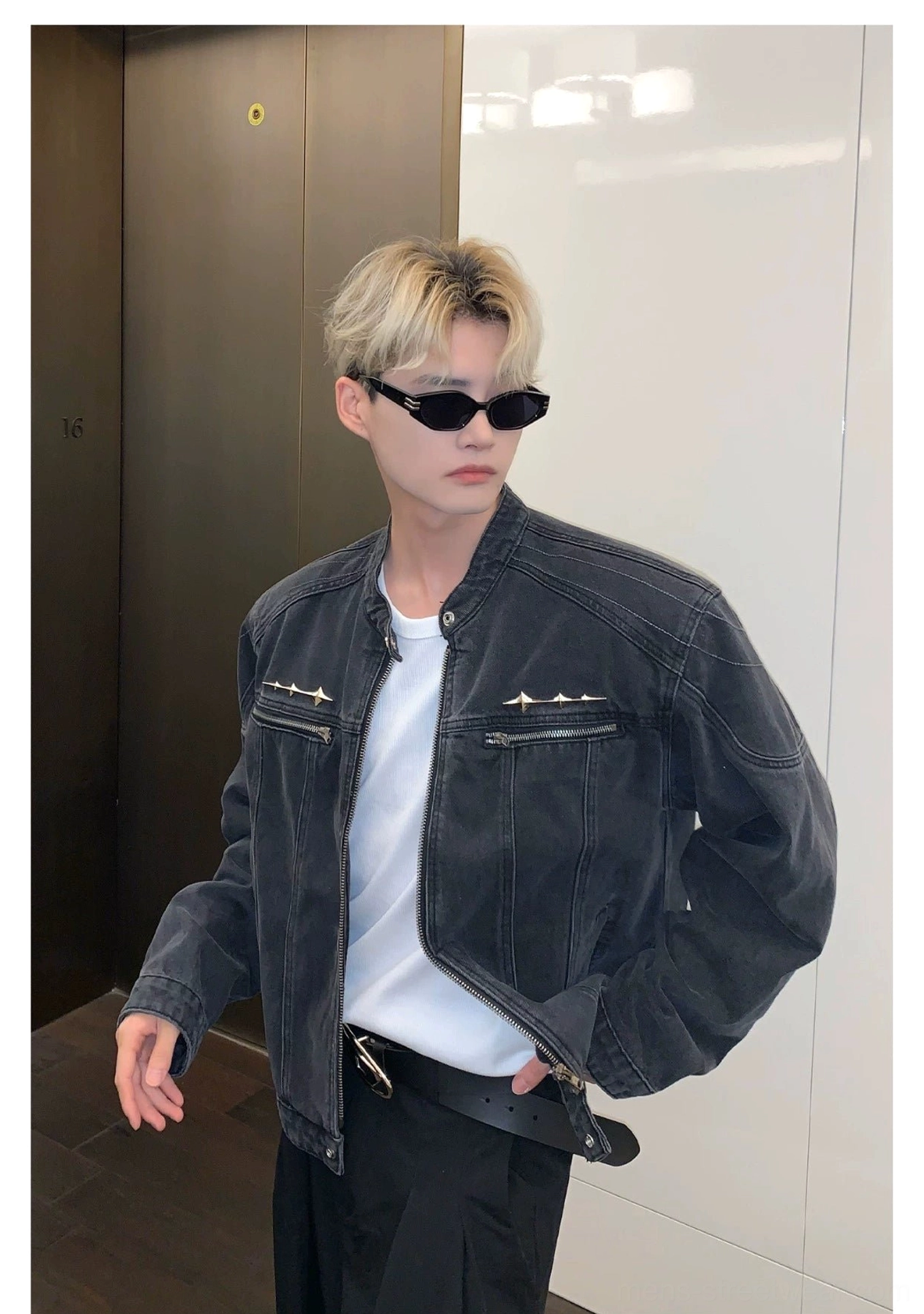 Cropped stand collar washed denim moto jacket with metal chest zippers and snap collar