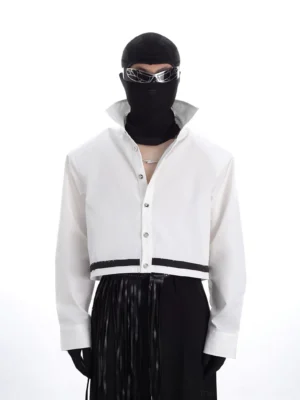 Front view of a white monochrome cropped streetwear jacket with structured stand collar, snap-button placket, black hem stripe, and oversized Korean fashion silhouette