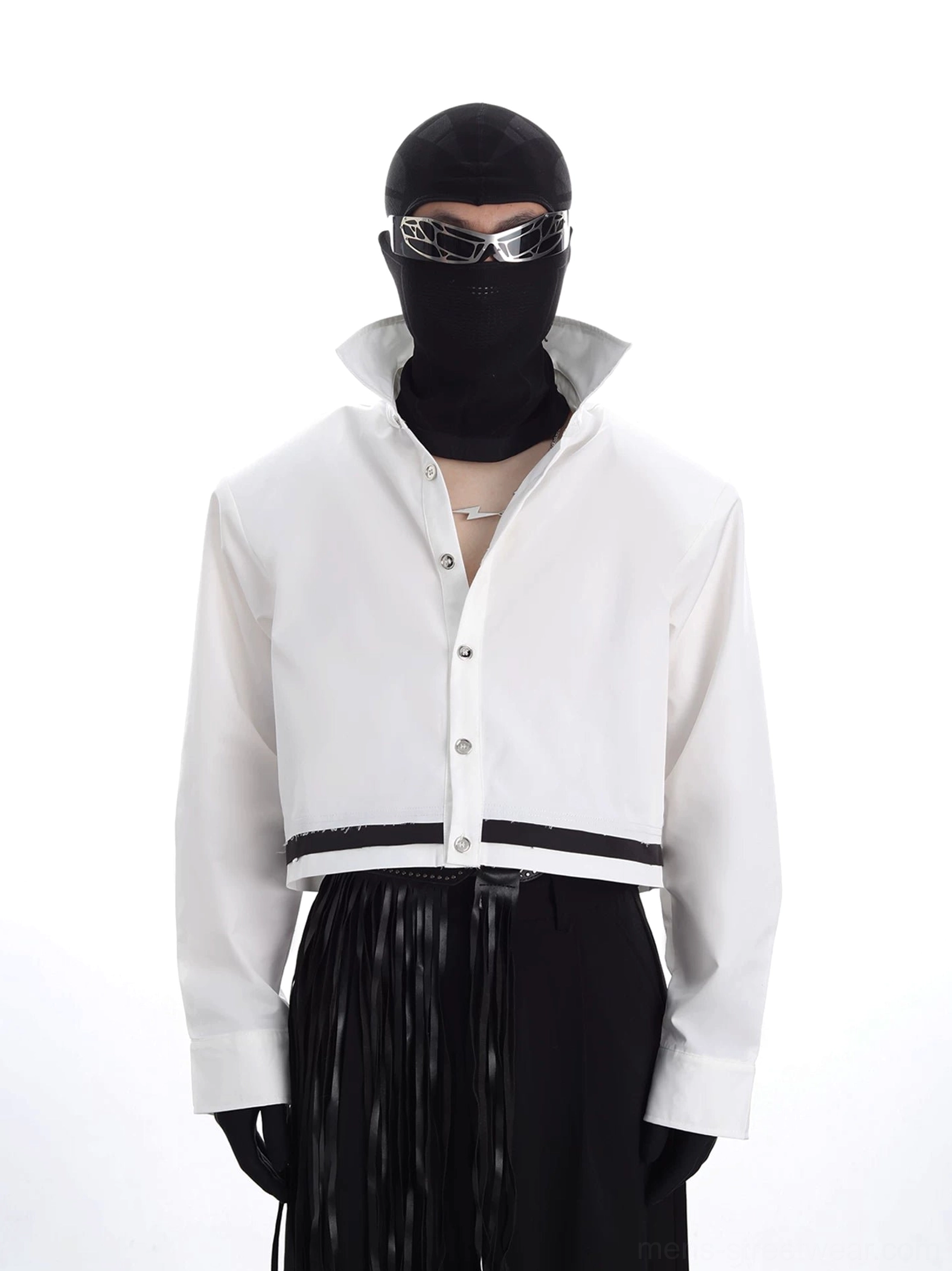 Front view of a white monochrome cropped streetwear jacket with structured stand collar, snap-button placket, black hem stripe, and oversized Korean fashion silhouette